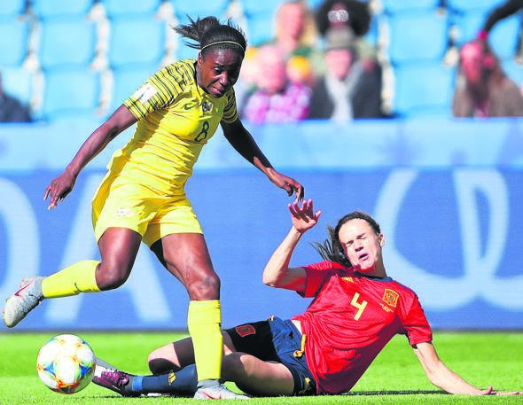 Ode Fulutudilu dribbles her way past Irene Paredes of Spain in the Women’s World Cup in France.Photo byGetty Images