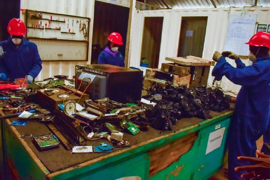 A team of technicians at the e-waste recycling facility.