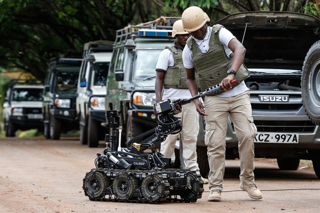  A member of the Kenyan police’s General Service Unit (GSU) controls a bomb disposal robot during an exercise in Nairobi, in October 2021. (Photo by AFP)