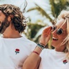 Instagram couple give up day jobs to “honeymoon forever”