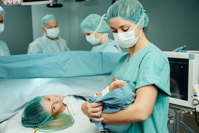 I was one of those people that thought a C-Section was 'unnatural'. Picture: Supplied/Getty Images