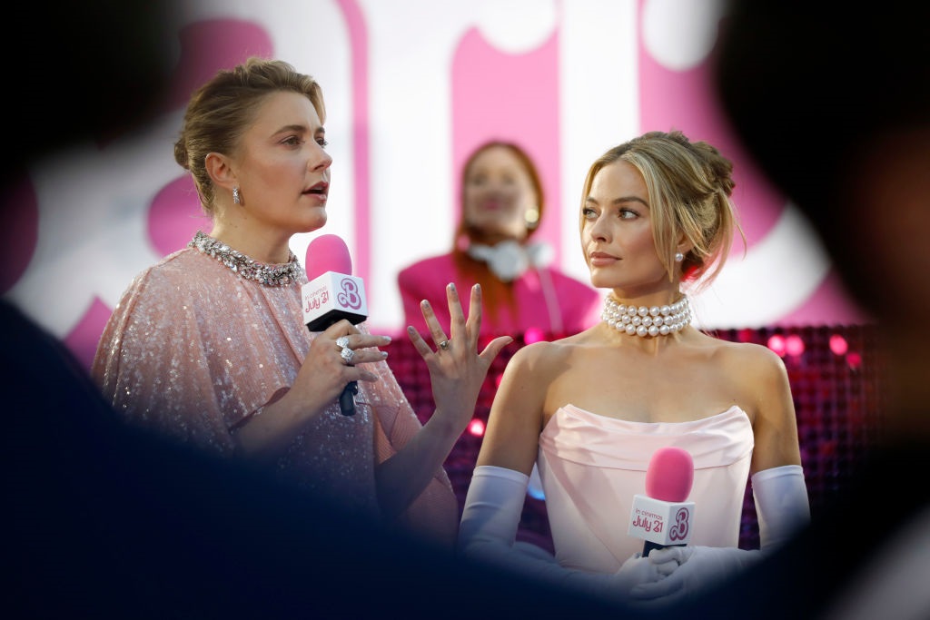 LONDON, ENGLAND - JULY 12: Greta Gerwig and Margot Robbie on stage during The European Premiere Of Barbie at Cineworld Leicester Square on July 12, 2023 in London, England. 