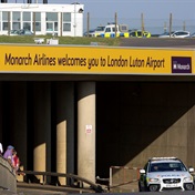London's Luton Airport says all flights suspended after 'significant' car park fire