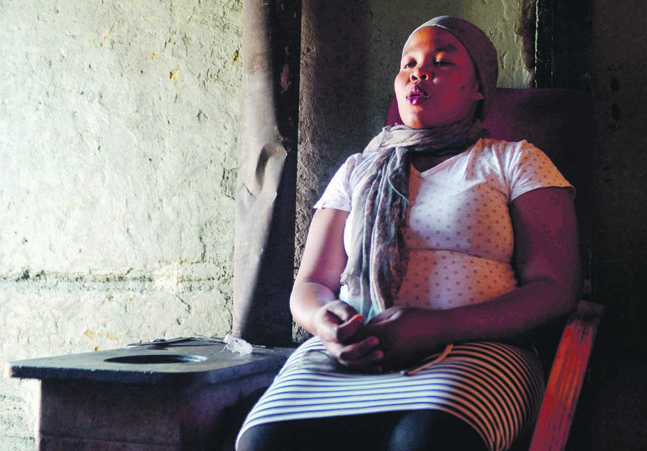 Slindile Kubheka mourns the death of her cousin Mbali Mazibuko, who was killed for spilling a glass of whisky. Inset: Mbali Mazibuko.                                Photo by Lucky Morajane