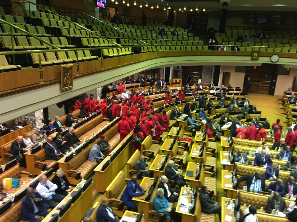 EFF members leave the chamber while Minister of State Enterprises Pravin Gordhan addressed the House. (Jan Gerber, News24)