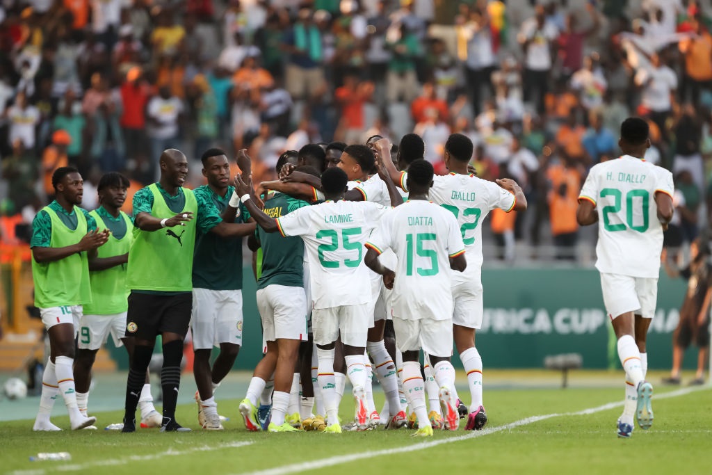 YAMOUSSOUKRO, IVORY COAST - JANUARY 19: IsmaÃ¯la Sarr of Senegal celebrates with his teammates after scoring his teams first goal during the TotalEnergies CAF Africa Cup of Nations group stage match between Senegal and Cameroon at  on January 19, 2024 in Yamoussoukro, Ivory Coast. (Photo by MB Media/Getty Images)
