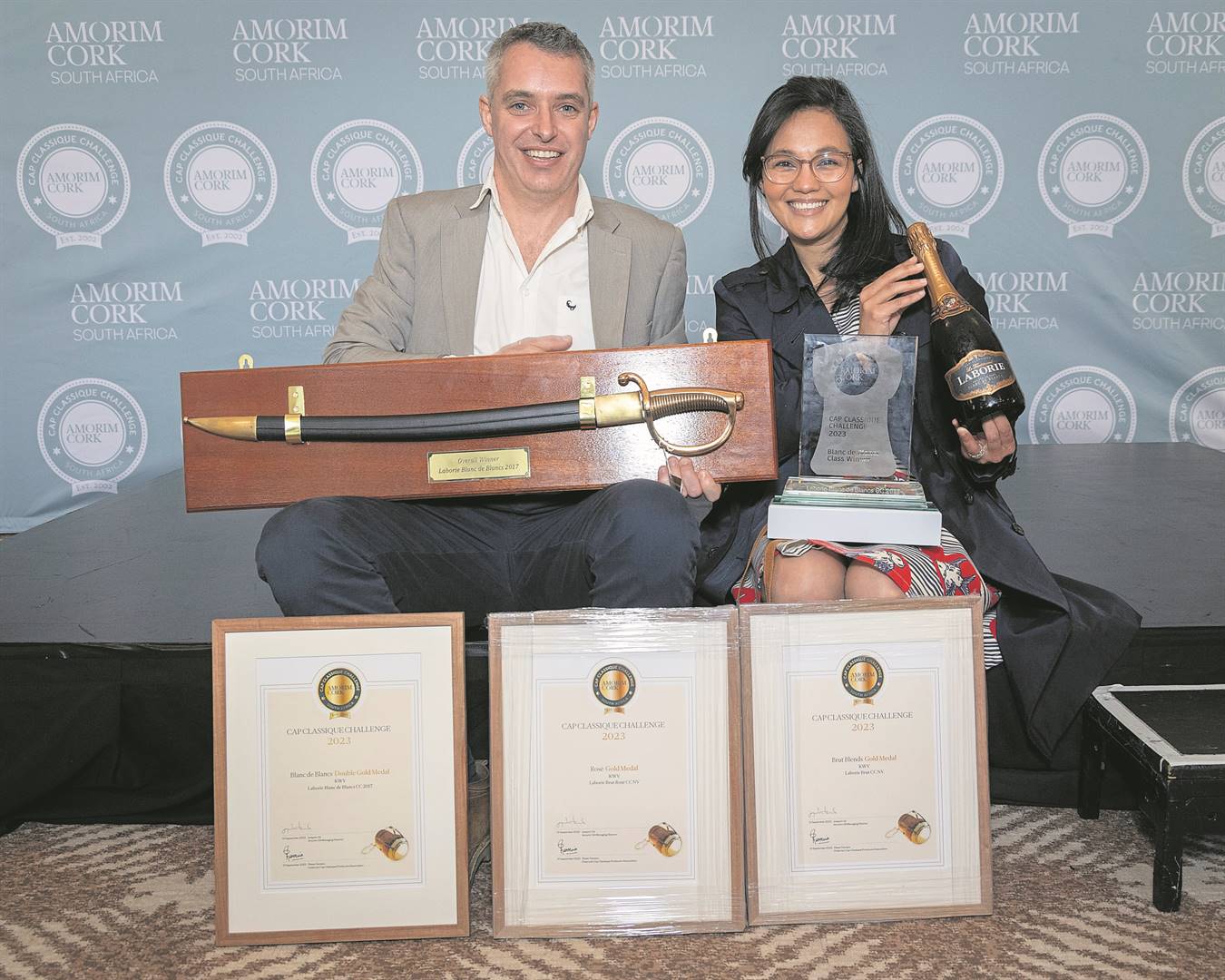 Kobus van der Merwe, head-winemaker responsible for white wine and Cap Classique at KWV with KWV winemaker Sacha Muller celebrate their win at the Amorim Cap Callissique Awards.