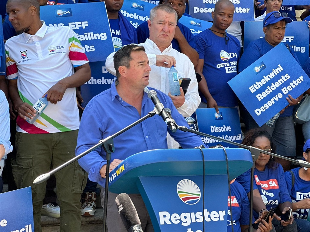 DA leader John Steenhuisen addresses party supporters outside the eThekwini City Hall. 