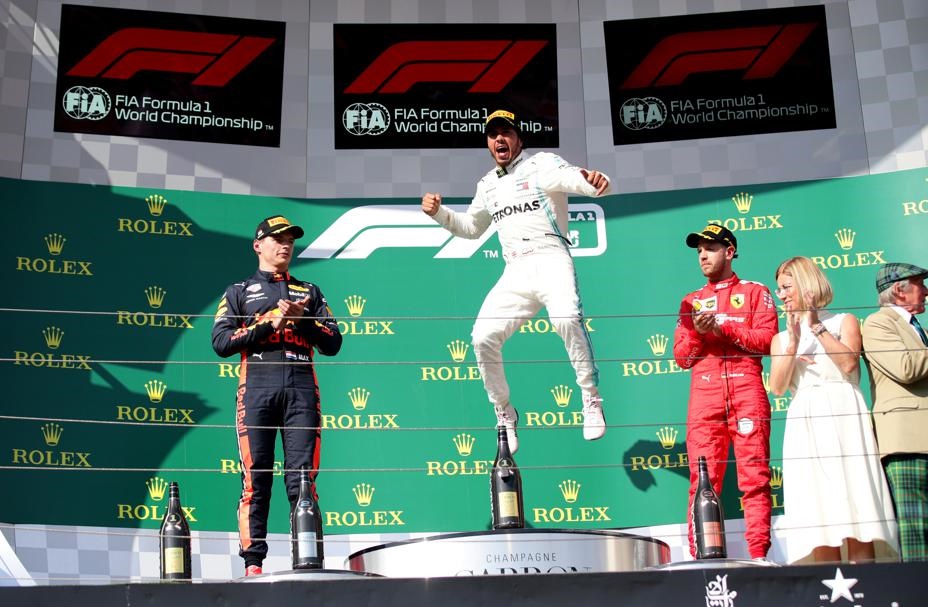 Mercedes' LewisHamilton, Red Bull's Max Verstappen and Ferrari's Sebastian Vettel celebrate finishing first, second and third on the podium. Picture: Lisi Niesner/Reuters