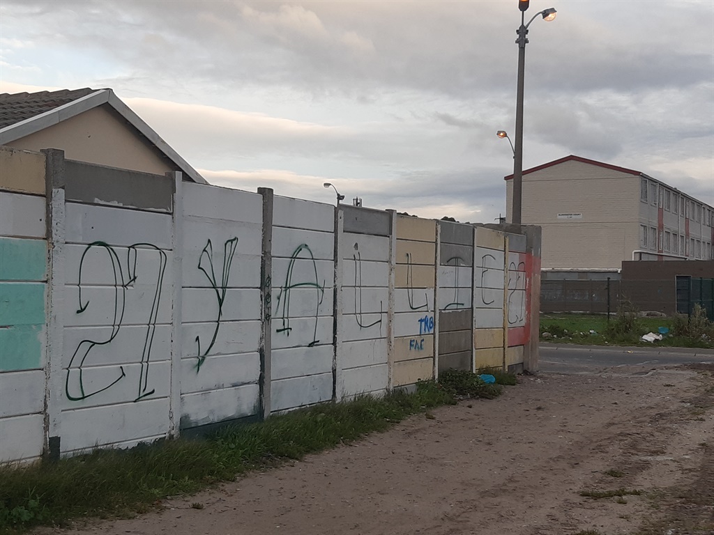 Gang graffiti on a wall in Hanover Park. (Tammy Pe