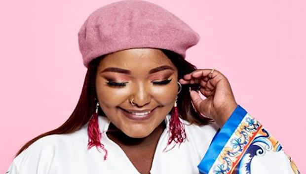 Style influencer Yoliswa Mqoco in a bright coloured beret