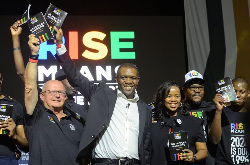 Rise Mzansi leader Songezo Zibi (second from left) with other party leaders during their manifesto launch in Tshwane on Saturday. Photo by Raymond Morare