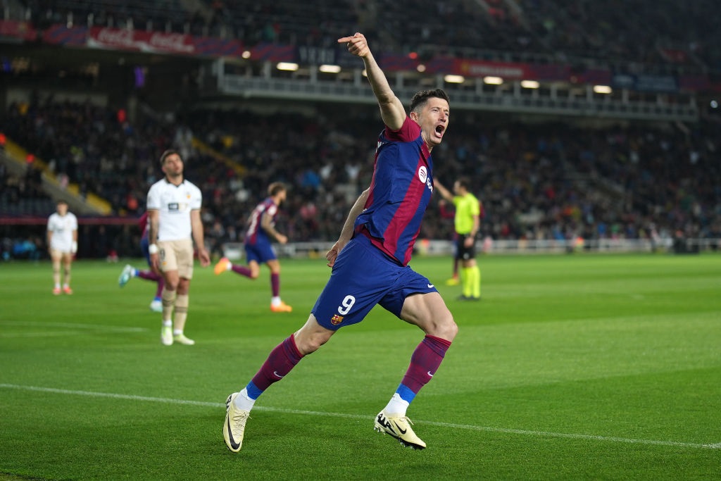 BARCELONA, SPAIN - APRIL 29: Robert Lewandowski of FC Barcelona celebrates scoring his teams second goal during the LaLiga EA Sports match between FC Barcelona and Valencia CF at Estadi Olimpic Lluis Companys on April 29, 2024 in Barcelona, Spain. (Photo by Alex Caparros/Getty Images) (Photo by Alex Caparros/Getty Images)