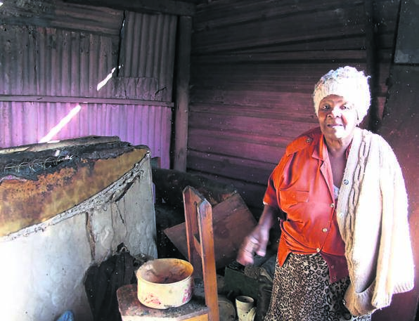 Gogo Johanna Nkabinde lost many items in the fire.                      Photo by Phineas Khoza