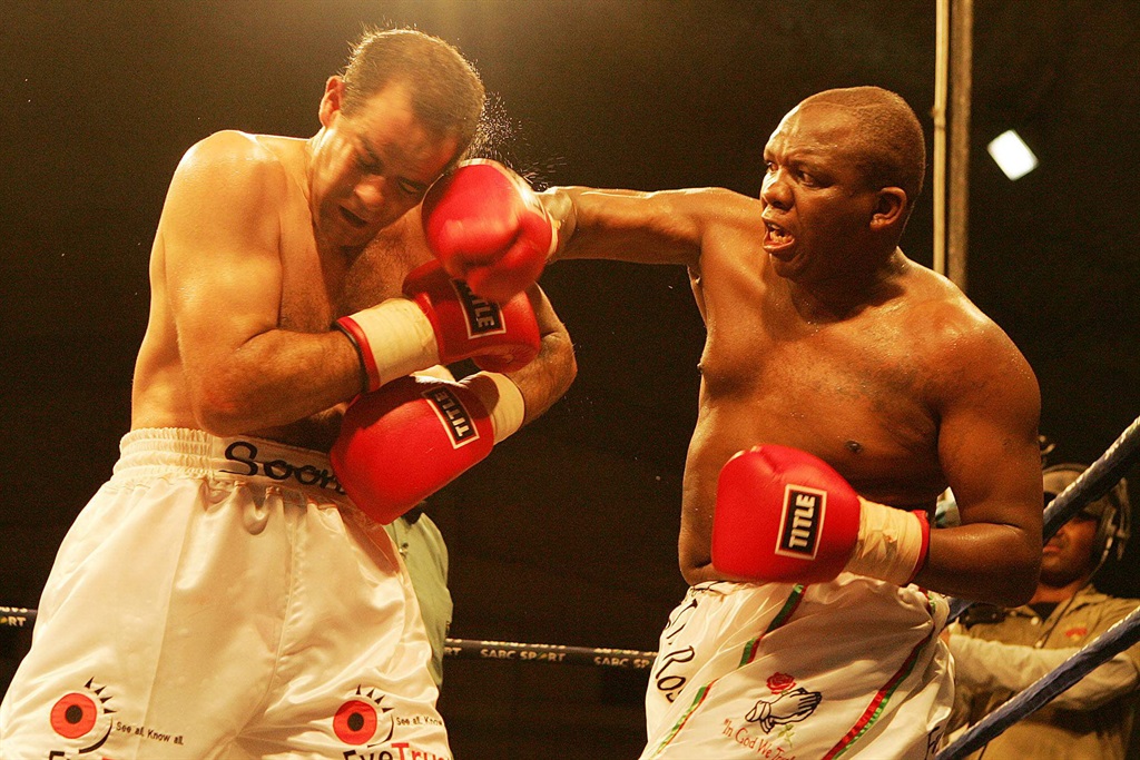 Dingaan Thobela launches a punch at Soon Botes during their fight at the Wembley Arena in Johannesburg in 2006. Thobela died on 29 April 2024