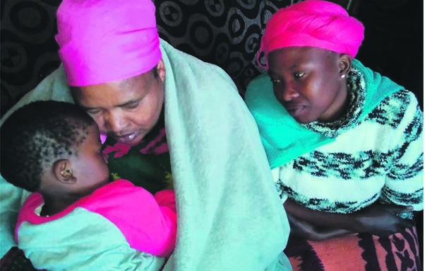 From left: Gogo Mamorena Letsholo with Botshelo’s mum Nthabiseng Molete comfort granddaughter Tlhonolofatso.