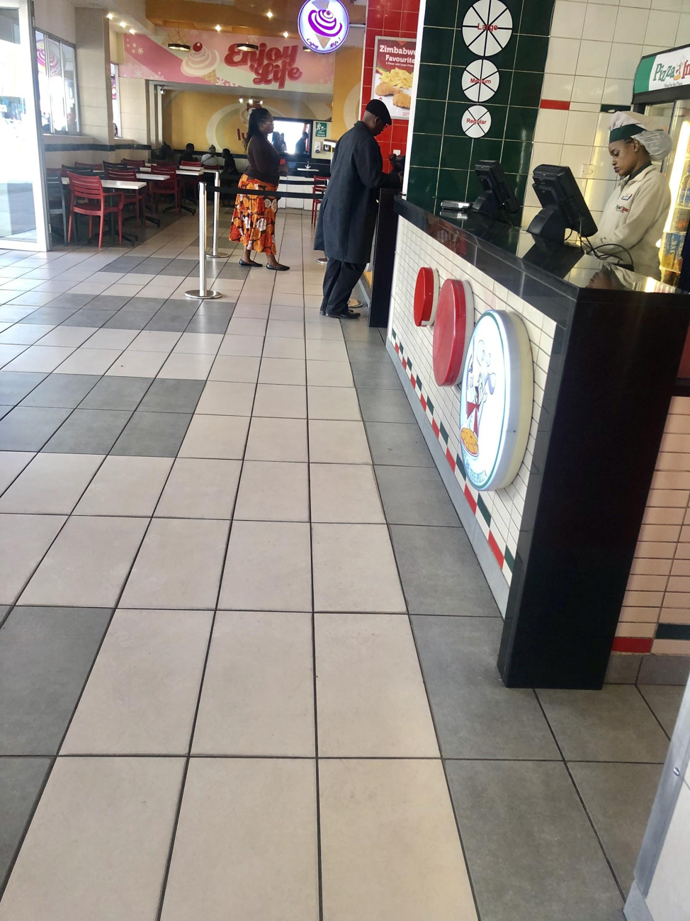 An empty Pizza Inn outlet during a Tuesday lunchti