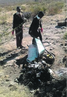 Pupils at Mohlophe School push a wheelbarrow allegedly full of sewage. 