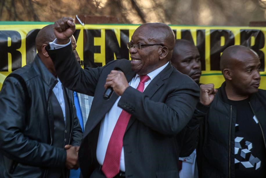 Former president Jacob Zuma addresses supporters after his appearance at the commission of inquiry into state capture. Picture: Mujahid Safodien/AP