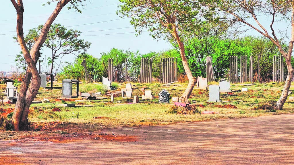 Thieves have stolen concrete palisade fencing from Avalon Cemetery, leaving graves exposed to further theft. Photo: Alex Patrick / News24