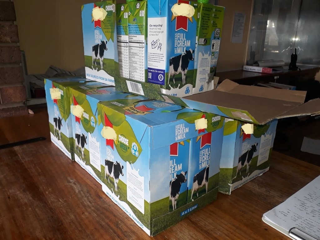 The boxes of milk that were found in possession of the suspected thief.