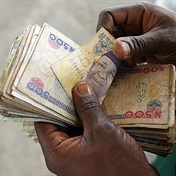 Website blamed by Nigeria for naira fall suspends rate tracking