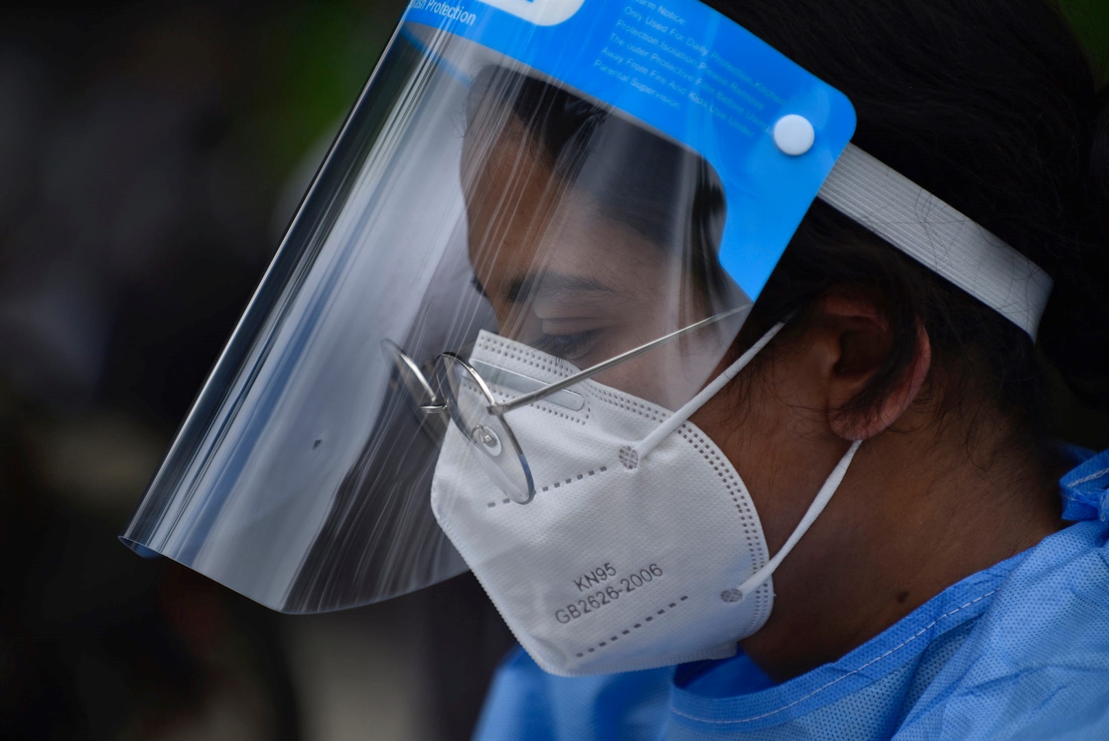 A Nepalese health worker in protective gear, ready to collect swab samples to test them for the coronavirus in Singh Durbar, Kathmandu, Nepal on Wednesday, July 29, 2020.
