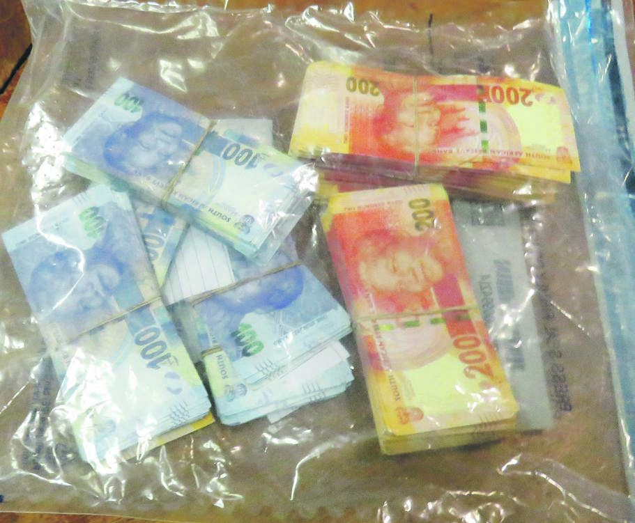 Cops confiscated fong kong money from the suspect. 
