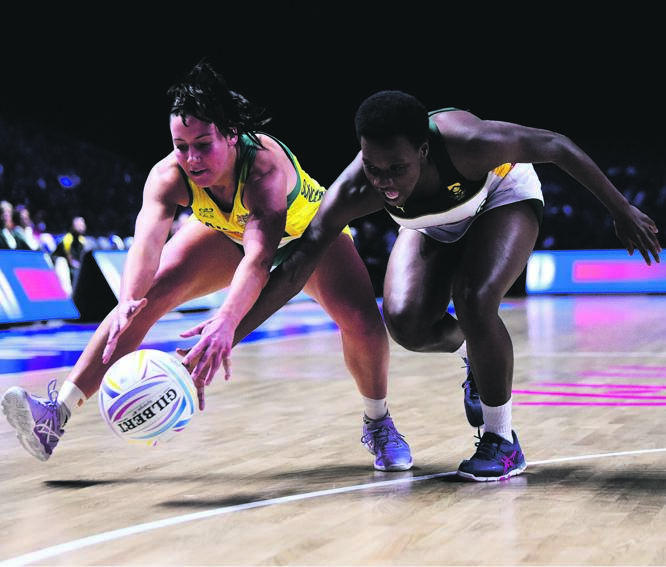 Australia’s Kelsey Browne and SA’s Khanyisa Chawane face off during their World Cup semifinal clash in Liverpool. Picture: Nathan Stirk / Getty Images