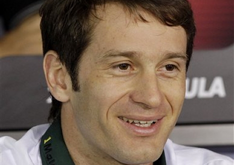 STAYING?: Jarno Trulli's extended stay at Lotus still to be confirmed.