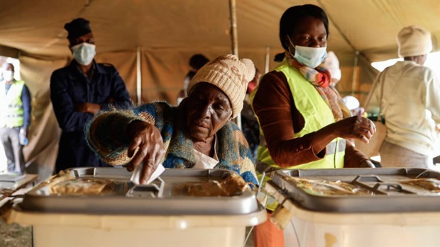 <p>A woman casts her ballot at a polling station during the presidential and legislative elections in Mbare, Harare. </p><p><em>(Photo by John Wessels/AFP)</em></p>