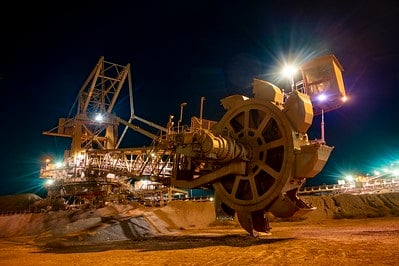 At Anglo's Kolomela mine near Postmasburg in the Northern Cape, this bucket wheel excavator and stacker reclaimer work in combination 24/7 to reclaim iron ore and then stack it in bulk quantities. Photo: Anglo American
