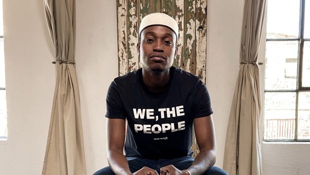 Tshepo Mohala wears the "We, the People" limited edition tee. Image supplied on behalf of Woolworths.