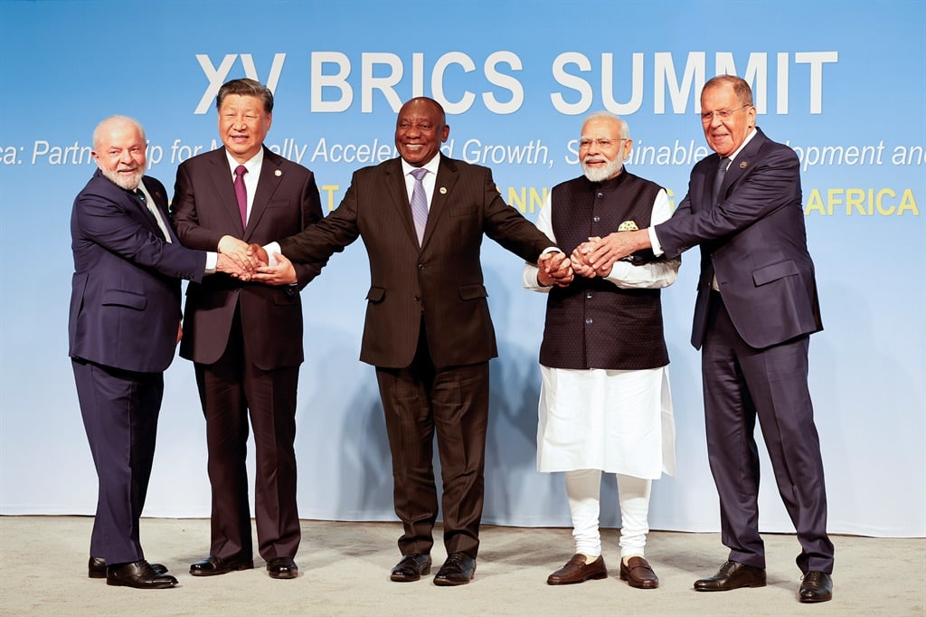 President of Brazil Luiz Inacio Lula da Silva, President of China Xi Jinping, South African President Cyril Ramaphosa, Prime Minister of India Narendra Modi and Russia's Foreign Minister Sergei Lavrov pose for a BRICS family photo during the 2023 BRICS Summit at the Sandton Convention Centre in Johannesburg on August 23, 2023. 