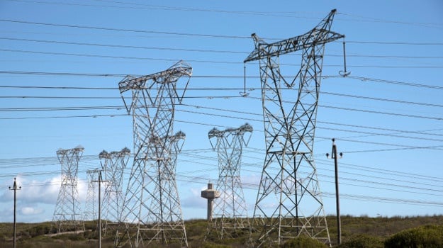 Power lines feed electricity to the national grid . (Photo by: Education Images/UIG via Getty Images)
