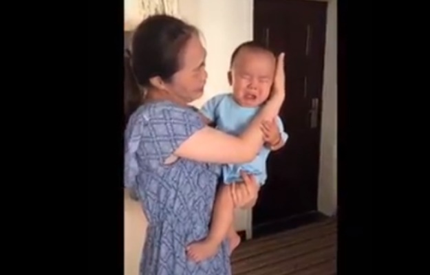 Crying baby in viral trend video. (PHOTO: Screengrab/reddit)