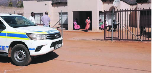 Police guard Limpopo councillor Valtyn Kekana's family home after he was gunned down together with sub-regional chairman Ralph Kanyane.