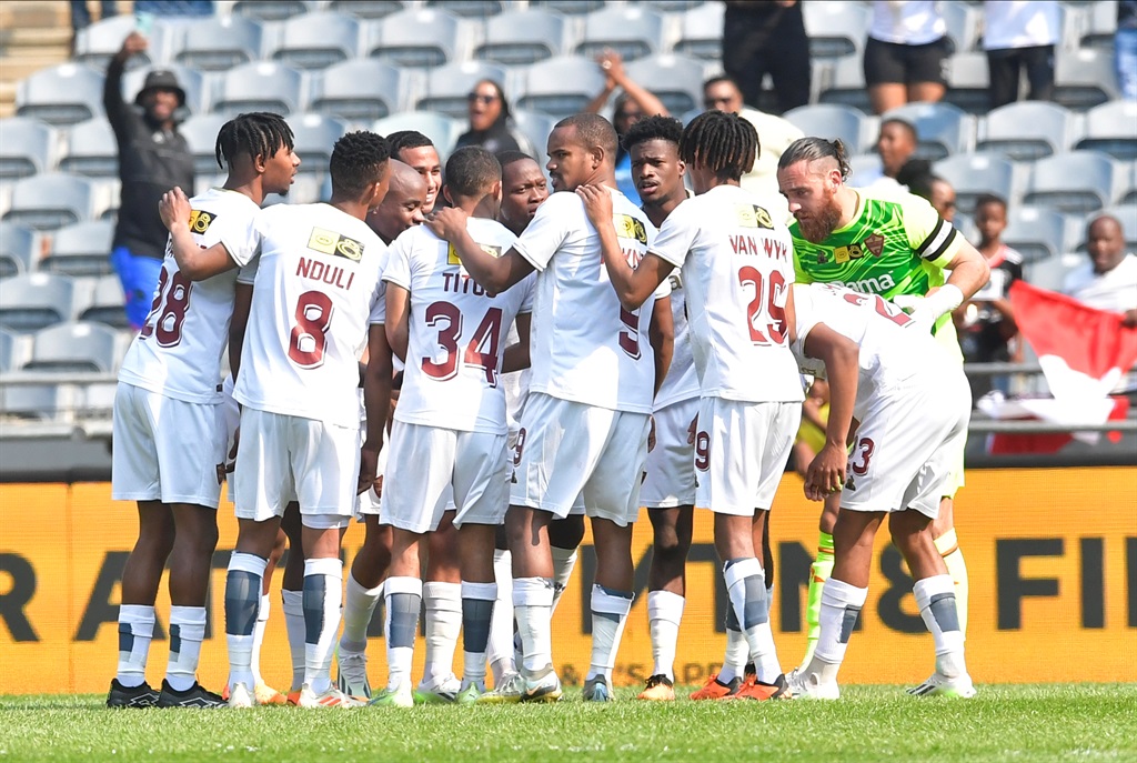 JOHANNESBURG, SOUTH AFRICA - SEPTEMBER 24:  Stellenbosch players take the field during the MTN8 semi final, 2nd leg match between Orlando Pirates and Stellenbosch FC at Orlando Stadium on September 24, 2023 in Johannesburg, South Africa. (Photo by Sydney Seshibedi/Gallo Images)