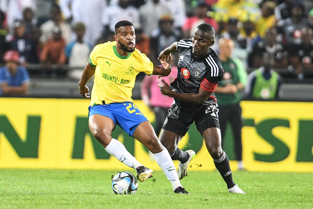 JOHANNESBURG, SOUTH AFRICA - SEPTEMBER 20: Sipho Mbule of Mamelodi Sundowns and Tapelo Xoki of Orlando Pirates during the DStv Premiership match between Orlando Pirates and Mamelodi Sundowns at Orlando Stadium on September 20, 2023 in Johannesburg, South Africa. (Photo by Lefty Shivambu/Gallo Images),?