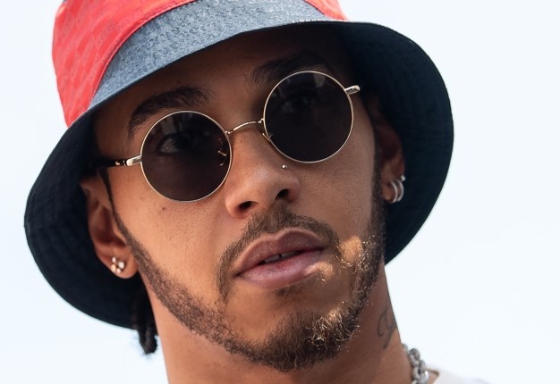 Mercedes' British driver Lewis Hamilton arrives on the track on July 25, 2019 in Hockenheim, southern Germany, prior to the Formula One German Grand Prix. Image: AFP / Sebastian Gollnow </i>