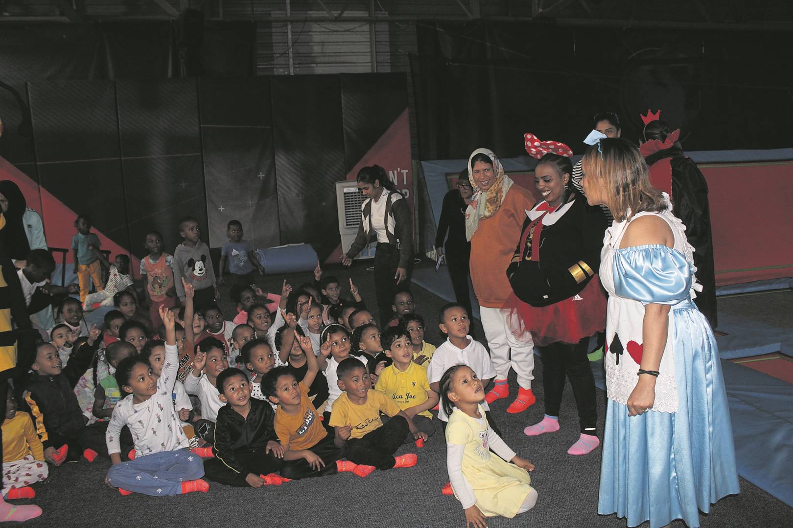 Nuhaa Portland, dressed up as Alice in the book Alice in Wonderland, delightfully caught the attention of all the Grade R learners in song, obediently containing their excitement while playing at Rush Claremont.
