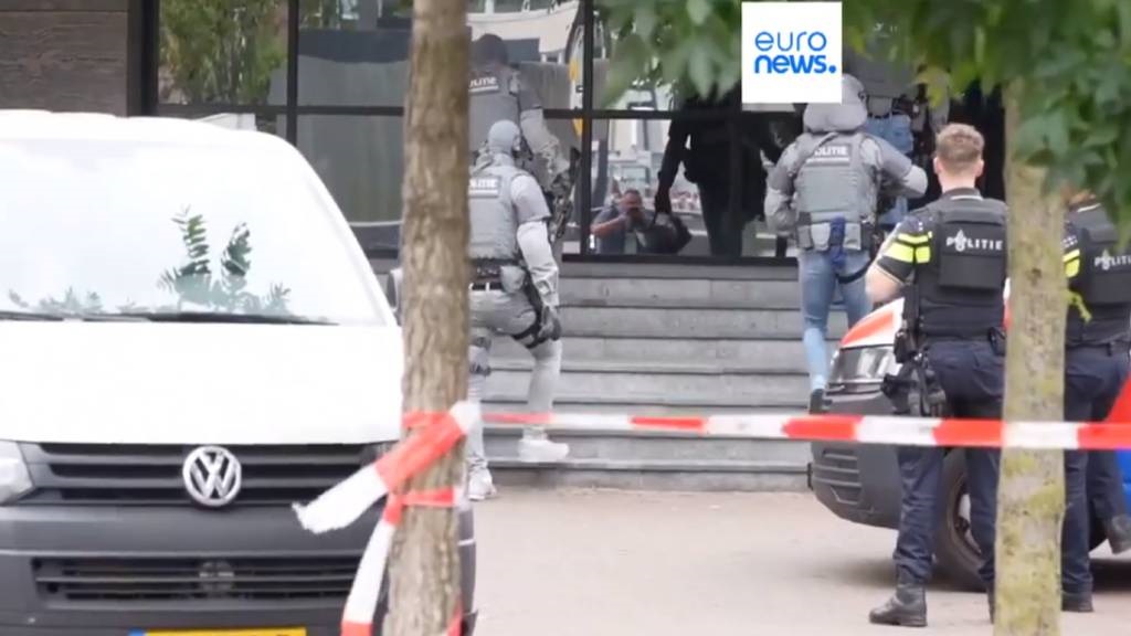 Police react to a hospital shooting in Rotterdam.