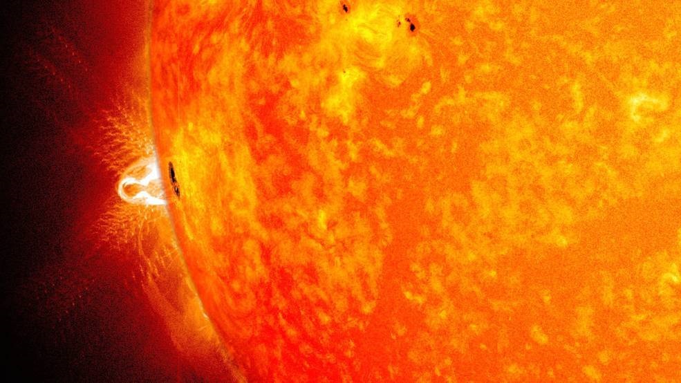 A blend of two images from NASA's Solar Dynamics Observatory show a sunspot in 2014.
