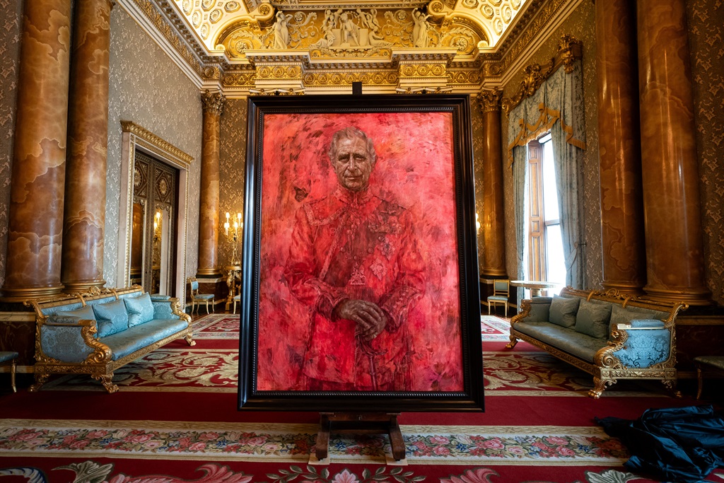 An official portrait of King Charles III, painted by artist Jonathan Yeo, is pictured during its unveiling, in the Blue Drawing Room at Buckingham Palace in London on May 14, 2024. (Aaron Chown/ POOL /AFP)