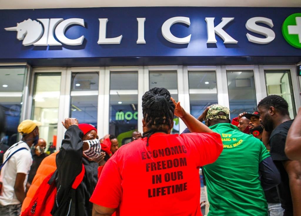Members of the Economic Freedom Fighters (EFF) are seen at Sandton City Mall during the national shutdown of all Clicks outlets.