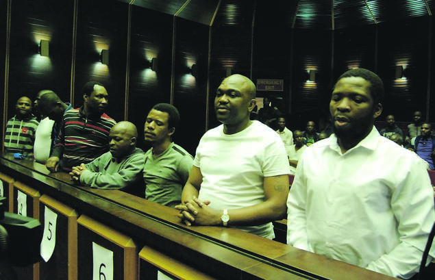 The eight accused of the Glebelands Hostel killings in Umlazi, southern Durban, appear in the Pietermaritzburg High Court. From left: Bhekukwazi Mdweshu, Khayelihle Mbuthuma, Vukani Mcobothi, Eugene Wonderboy Hlophe, Ncomekile MatlalaNtshangase, Mbuyiselwa Mahliphiza Mkhize, Mondli Talente Mthethwa and Bongani Mbhele. Picture: Phumlani Thabethe