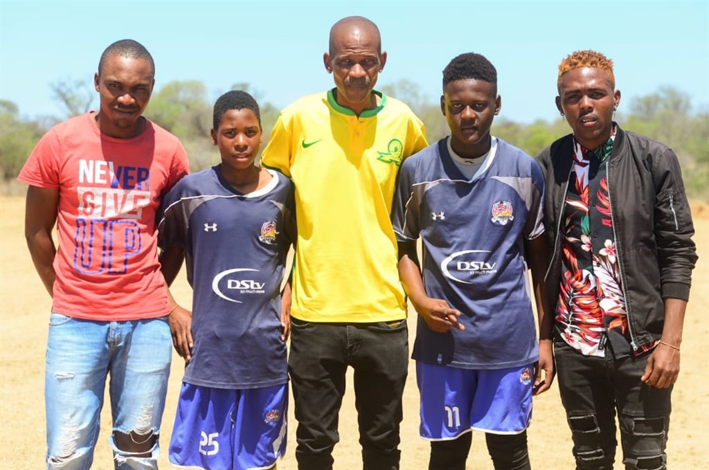 Saving Life Foundation founder, Mothupi Malebye (middle), hosted different sporting codes to bring the community together. Photo by Raymond Morare