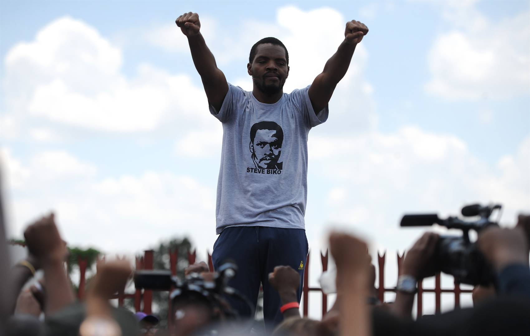 Mcebo Dlamini, the leader of the Fees Must Fall movement at Wits university, addresses a crowd outside the Palm Ridge magistrates’ court after being released on charges related to the protests. Picture: Felix Dlangamandla/Netwerk24