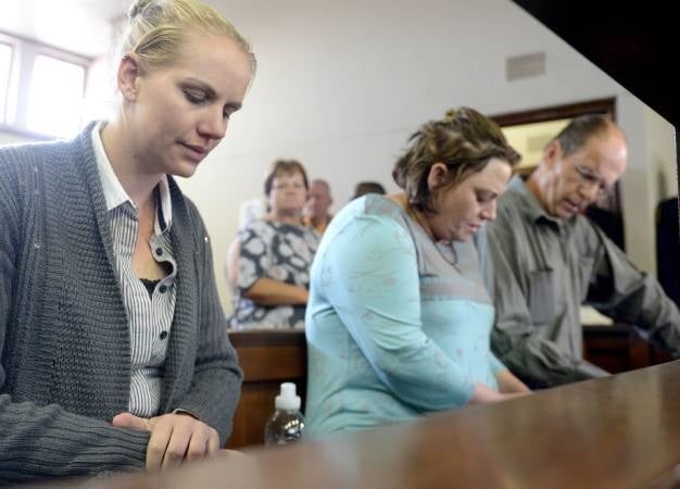 Accused kidnappers Piet van Zyl, Laetitia Nel, and Tharina Human are seen during the Amy'Leigh de Jager kidnapping case.