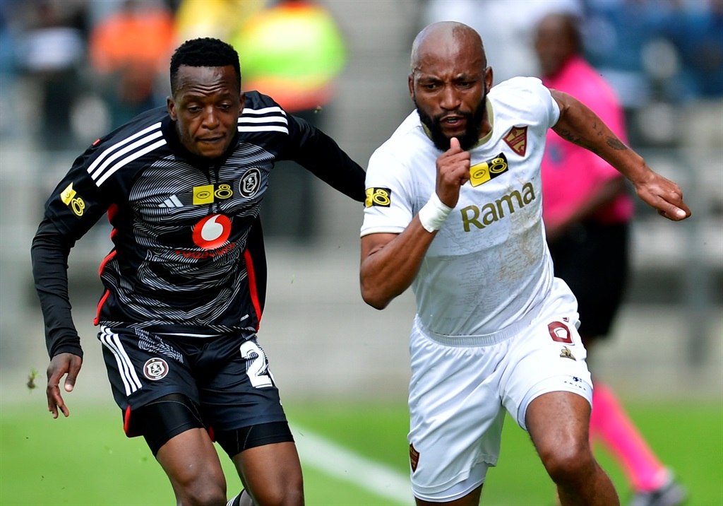 CAPE TOWN, SOUTH AFRICA - SEPTEMBER 03: Patrick Maswanganyi of Orlando Pirates and Sibongiseni Mthethwa of Stellenbosch FC during the MTN8 semi final, 1st leg match between Stellenbosch FC and Orlando Pirates at Athlone Stadium on September 03, 2023 in Cape Town, South Africa. (Photo by Ashley Vlotman/Gallo Images)